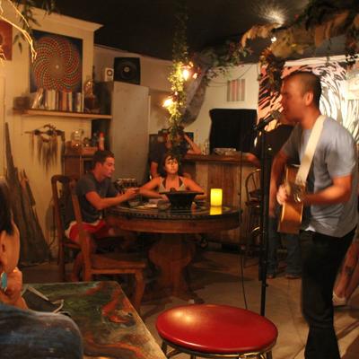 Live music, guests at tables.