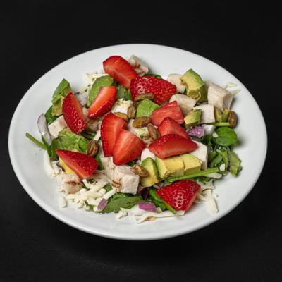 Strawberry Avocado Chicken Salad served on a white plate.