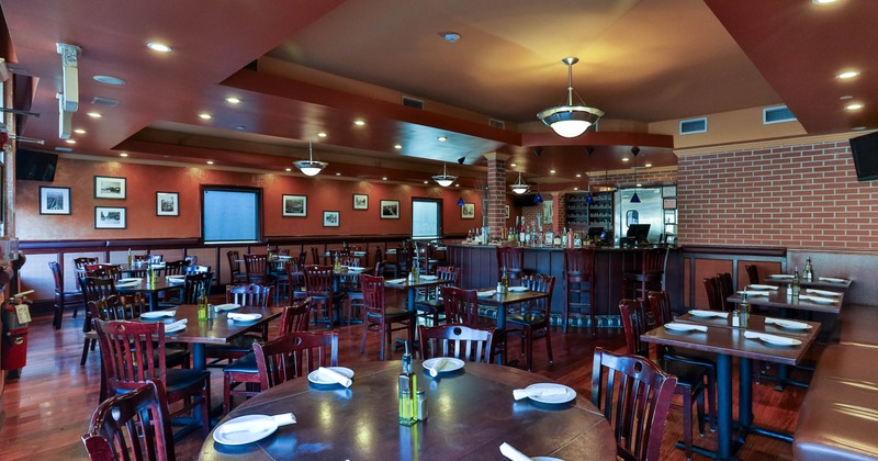 Interior dining area with wooden chairs and tables