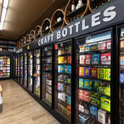Refrigerated beer bottles.