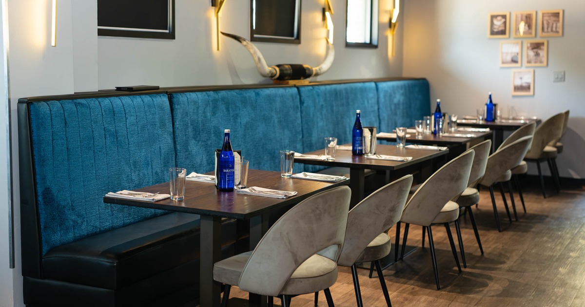Interior, tables, chairs and wall benches