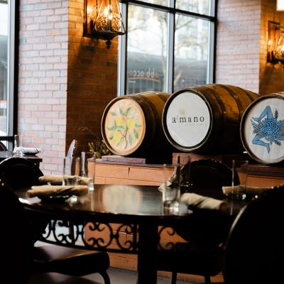 The restaurant's interior, wooden barrels.