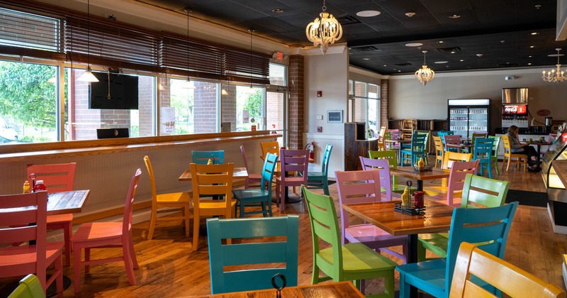 Interior, tables and chairs ready for guests