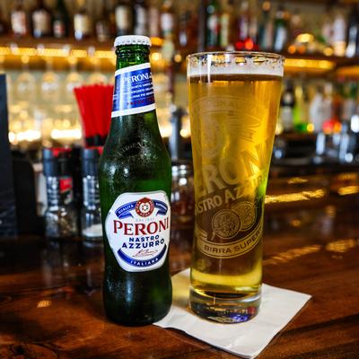 A bottle and a glass of beer.