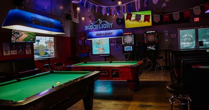 Interior, pool tables and dart games in the back