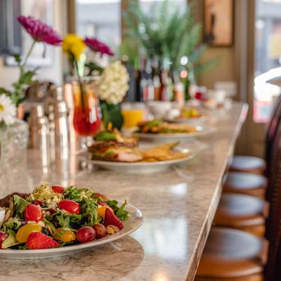 Various food and drinks on the table.