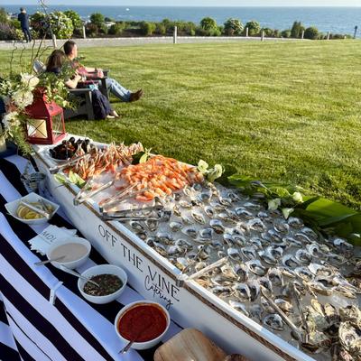 Outdoor seafood raw bar setup.