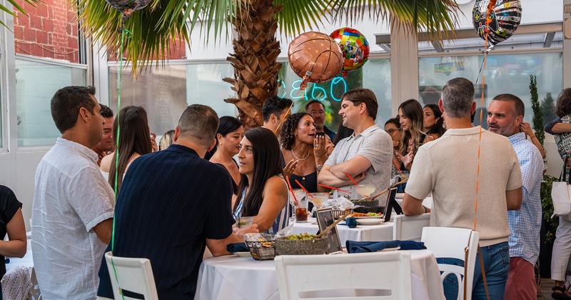 Guests chatting and enjoying at a private party