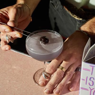 Bartender preparing a Water Lily cocktail.