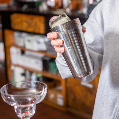 Bartender making a cocktail.