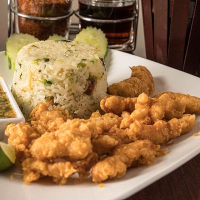 Thai crispy chicken served with fragrant rice.