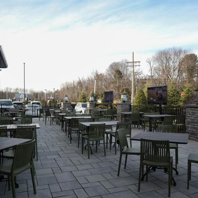Exterior, terrace, tables and chairs, wide view.