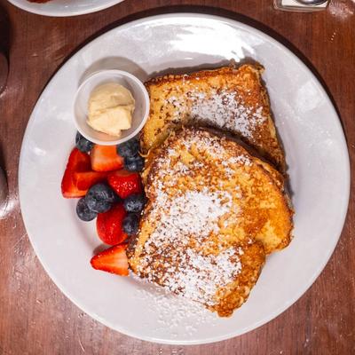 French toast served with fresh berries and maple butter.
