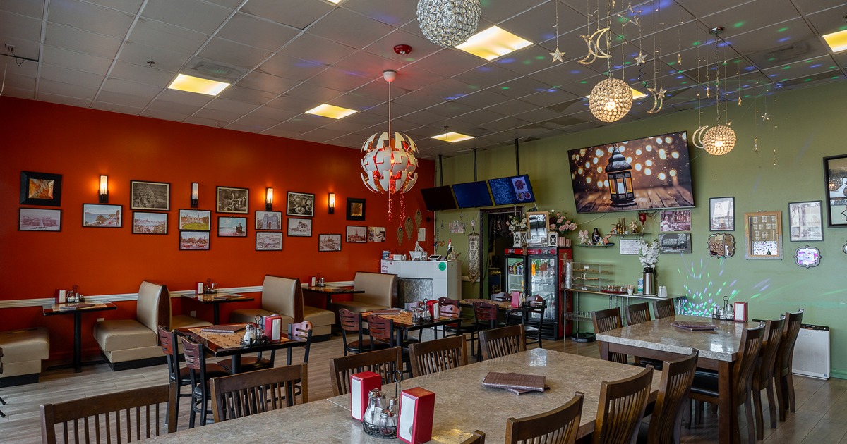 Cozy interior dining area with tables ready for guests