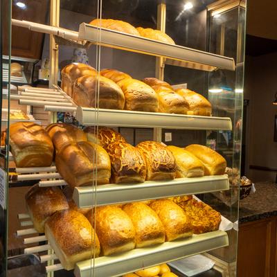Bakery shelves with bread.