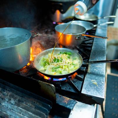 Vegetables in a frying pan.
