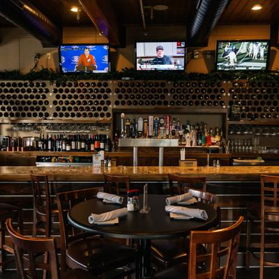 Interior, tables, bar area.