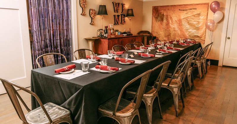 Interior, long table set for guests