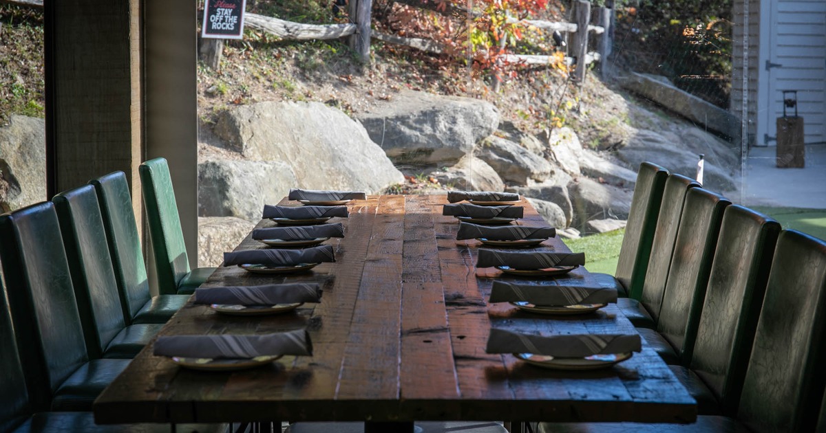 Large table on the terrace set and ready for guests