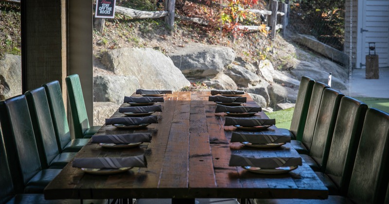 Large table on the terrace set and ready for guests