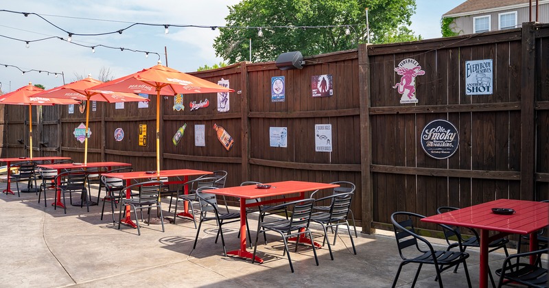 Outdoor seating area, tables, chairs and parasols