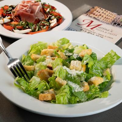 Caesar salad and antipasto salad.