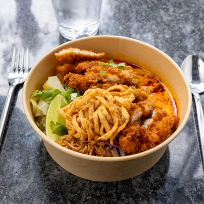 Crispy egg noodles in curry with fried chicken, pickled mustard, lime, and chili oil.