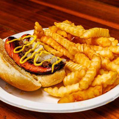 Red hot sandwich with fries on the side.