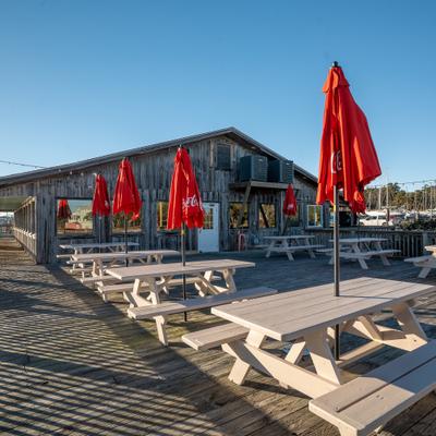 Exterior, tables, benches, parasols.