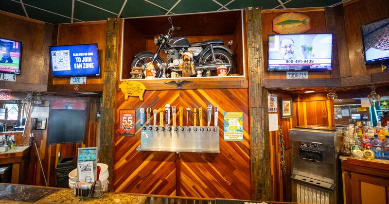 Bar. beer pipe line, tv screen above