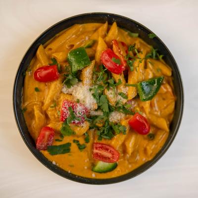 Bowl of Chicken Masala Alfredo Pasta, top view.