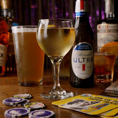 Drinks in glasses and bottles.