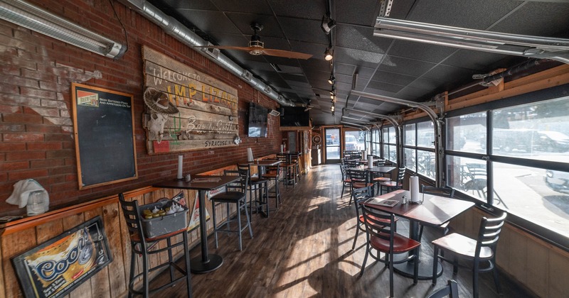Interior, tables and chairs in seating area