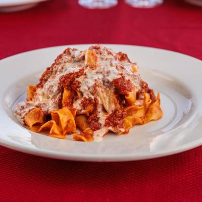 Pappardelle Bolognese pasta, with ground wild boar, wagyu beef, and pork