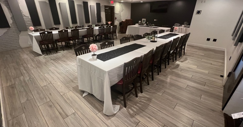 Dining area, two long tables for multiple people