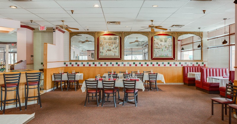 Interior, tables and chairs ready for guests