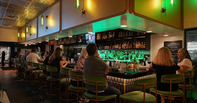 Interior, bar area with guests