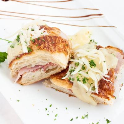 Croque Croissant, with bechamel sauce, Paris ham, and Swiss cheese.