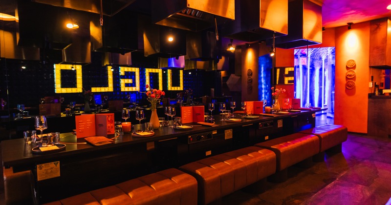 Modern interior dining area with set tables