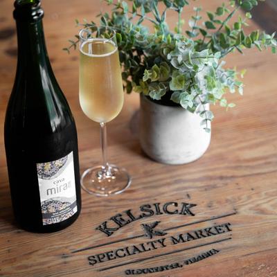 A served drink and decorative plants.