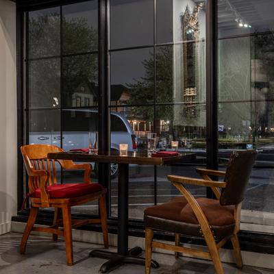 A table and chairs outdoors.