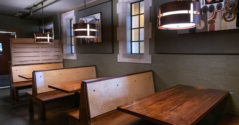 Interior with wooden booths and tables