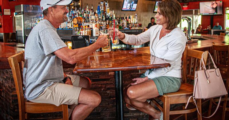 Interior, guests making a toast