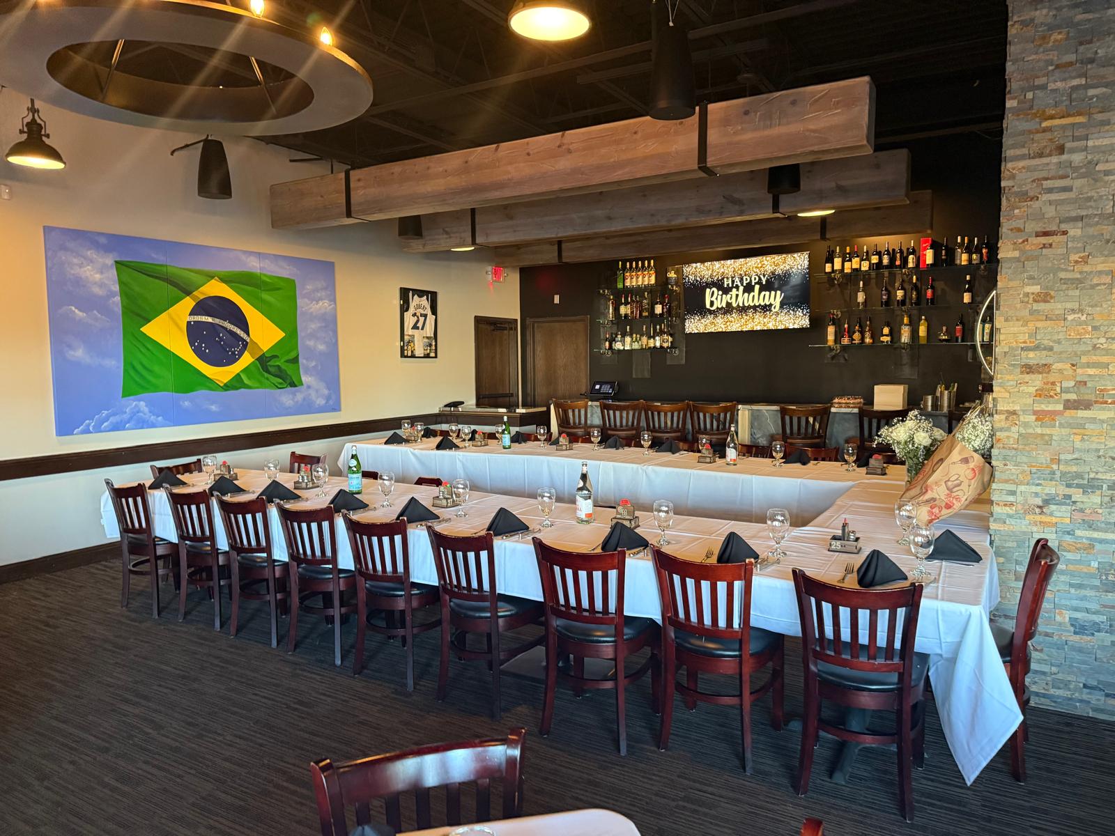 Interior - tables ready for guests, pictures on the wall