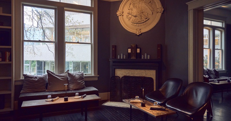 Interior, seating area with fireplace in the back