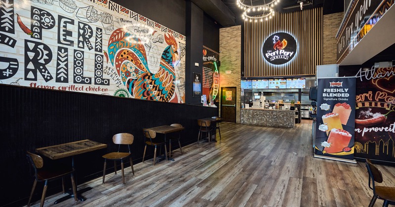 Tables by the wall mural