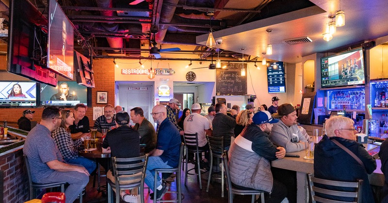 Interior, restaurant full of guests
