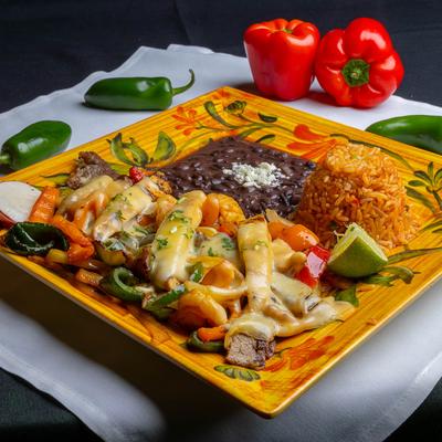 Chicken, steak, and shrimp Fajitas.
