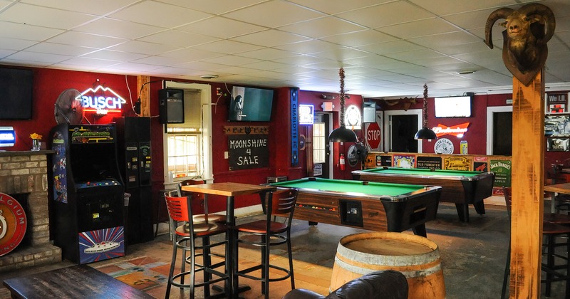 Interior, seating area and pool tables