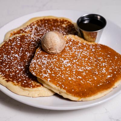Buttermilk Pancakes, with syrup, and a scoop of ice cream.